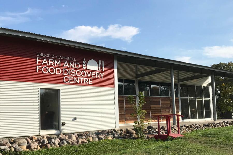 An exterior view of the Bruce D. Campbell Farm and Food Discovery Centre building.
