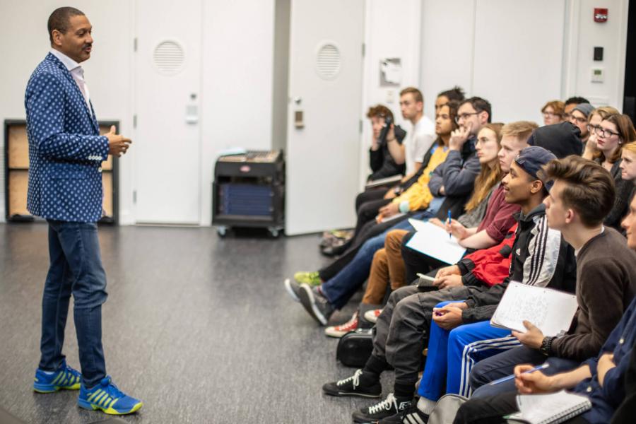 Delfeayo Marsalis, acclaimed jazz trombonist from the Marsalis family speaks in front of a group of music students. .