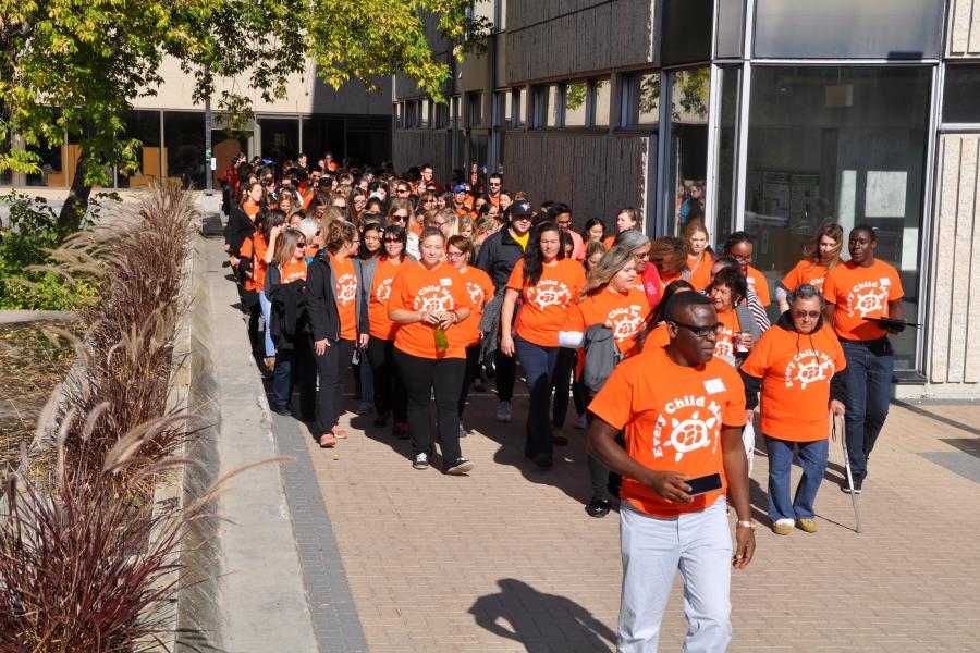 Students and staff walking for Orange Shirt Day