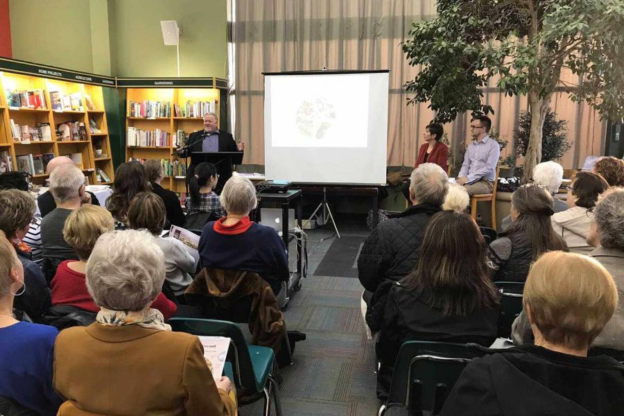 Dr. Jim House giving a presentation at McNally Robinson bookstore, Winnipeg.