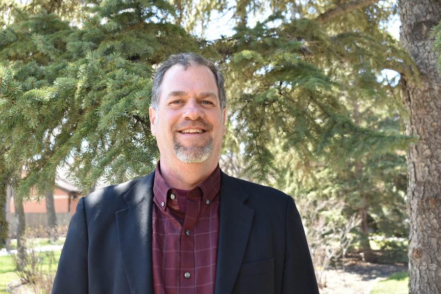 Dr. David Lobb standing outside