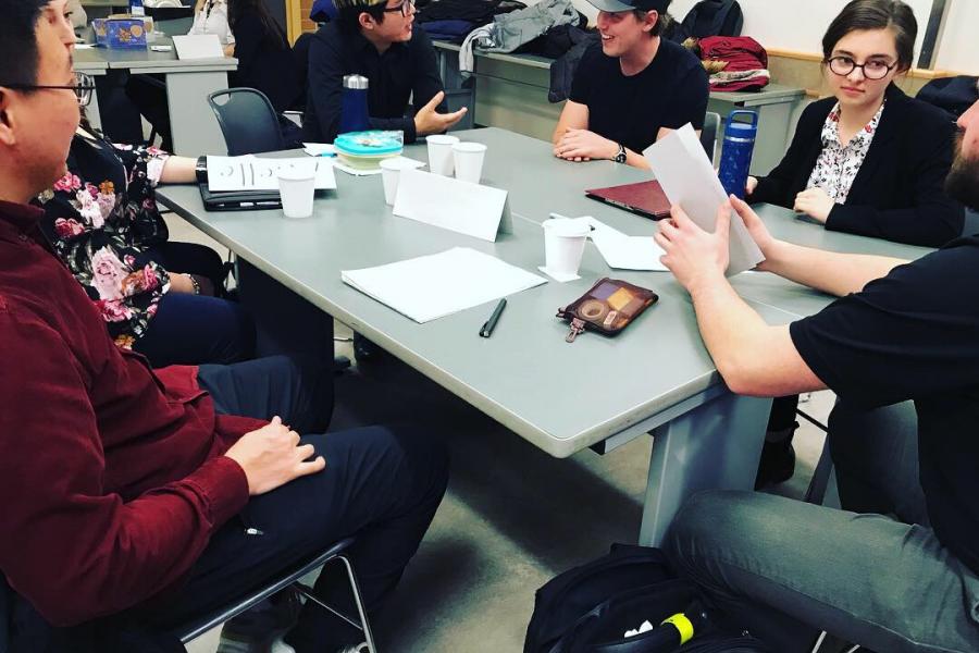 students sitting at table