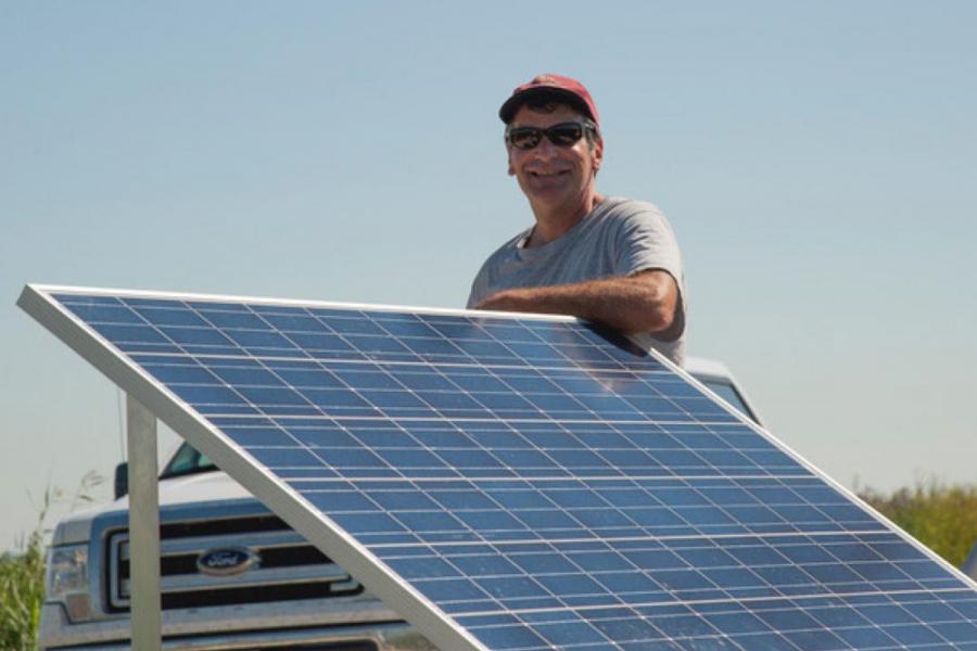 Tim Papakyriakou works on a solar grid