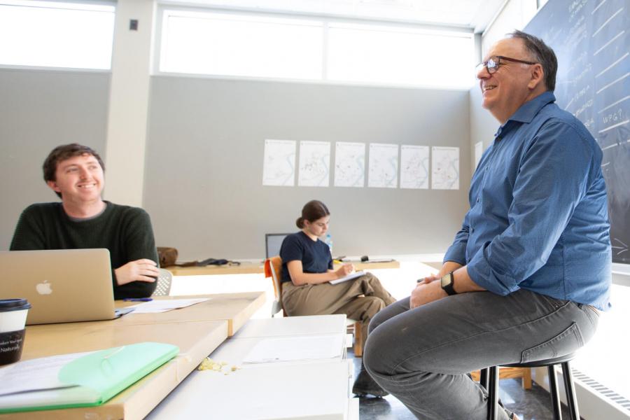 An architecture faculty member addresses a classroom of students.