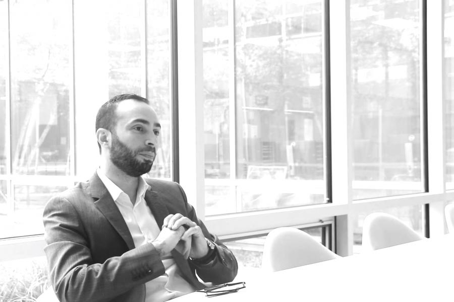 Mohamad Araji sitting at a table 