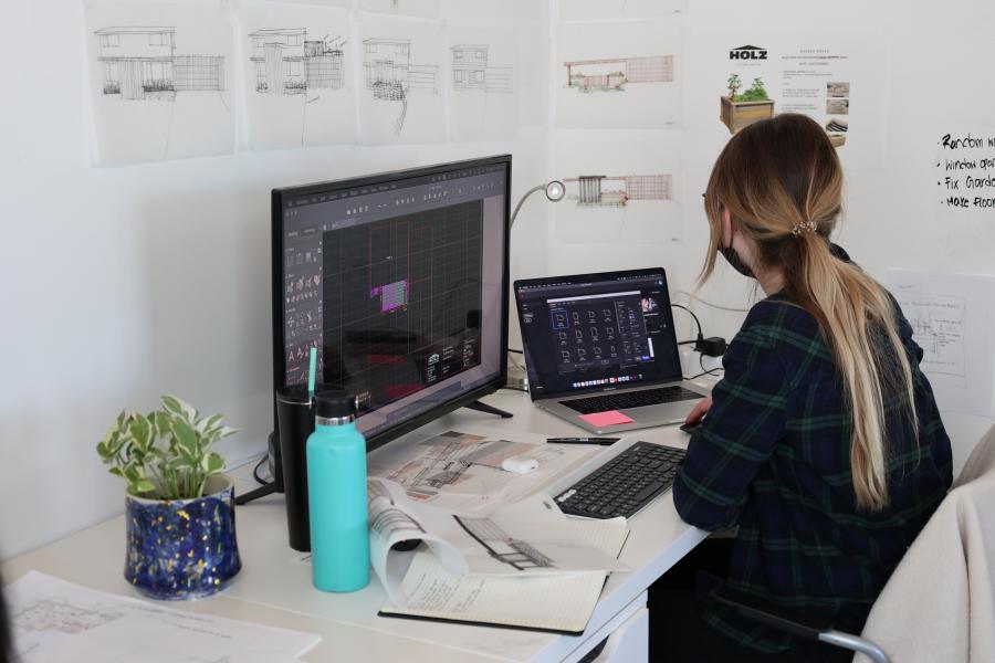 Student sitting at desk working.