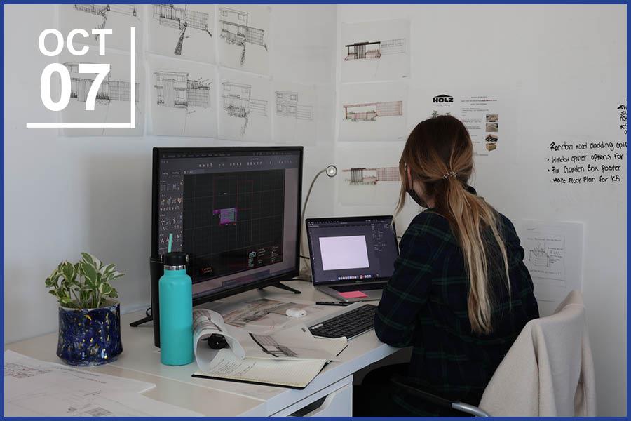 Student sitting at desk working.