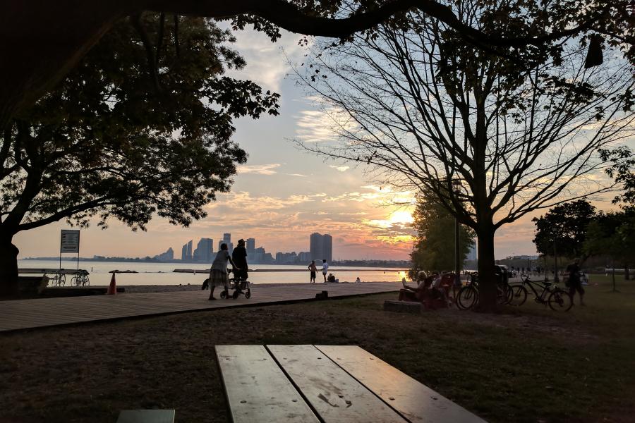 Sunset on beach, looking at the city.