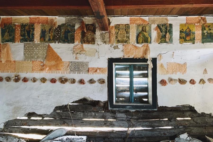 Abandoned home in rural Manitoba papered with Saints.