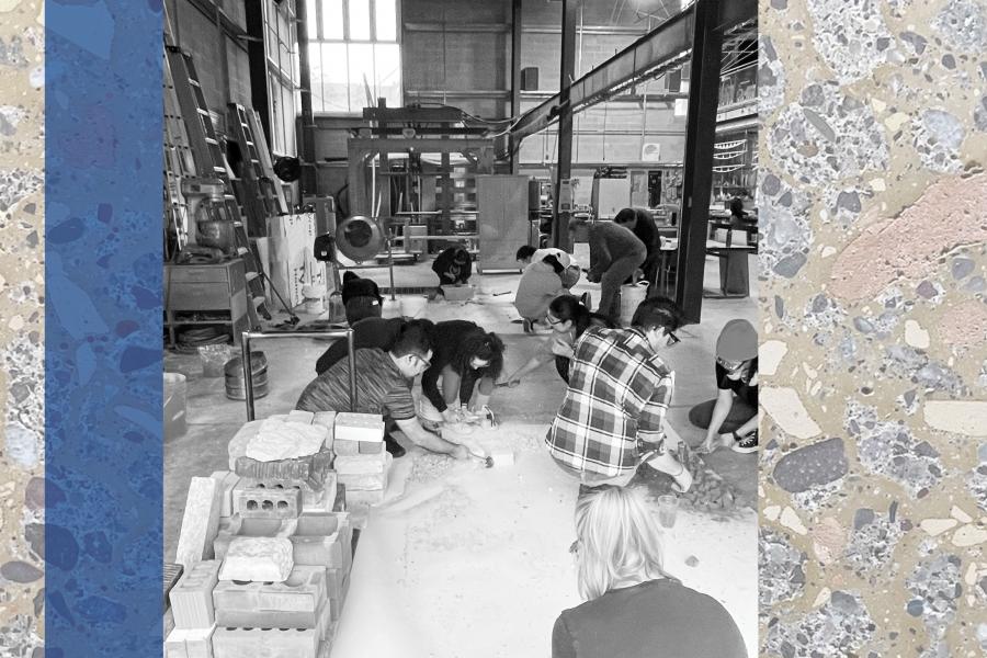 students working with cement shapes