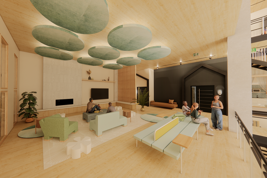 A group of people sitting in a room with 9 large green lighting fixtures above.