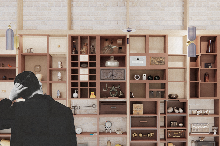A person in a suit looking at a shelf with objects.