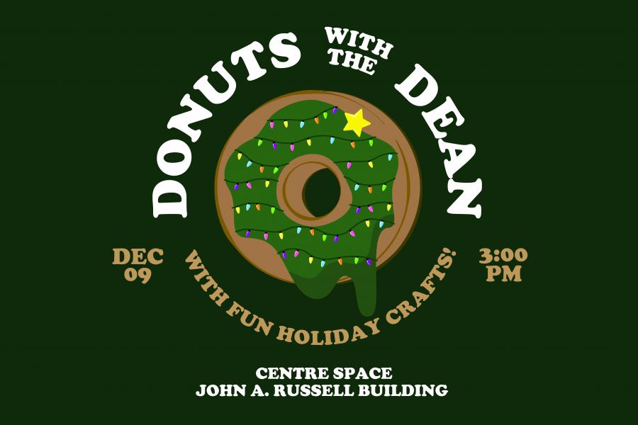 Green background, with a donuts that have icing decorated as a Christmas tree.