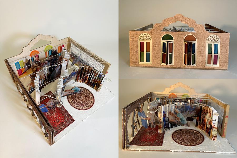 The miniature model features a decorative facade with colorful windows, a room displaying photo cards of elderly people and caregivers, and ornate rugs. The setup conveys intimacy and interconnected lives through spatial storytelling.