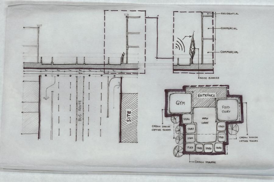 The image shows a site plan sketch featuring residential, commercial, and transportation areas, with a focus on noise barriers, carbon capture, and building complex layouts. The diagram includes labeled sections such as a gym, food court, and store spaces within the proposed development.