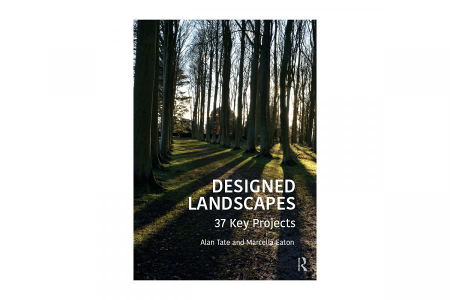 Cover of "Designed Landscapes" shows a forest with tall, bare trees casting long shadows on a path. The scene conveys tranquility and depth.