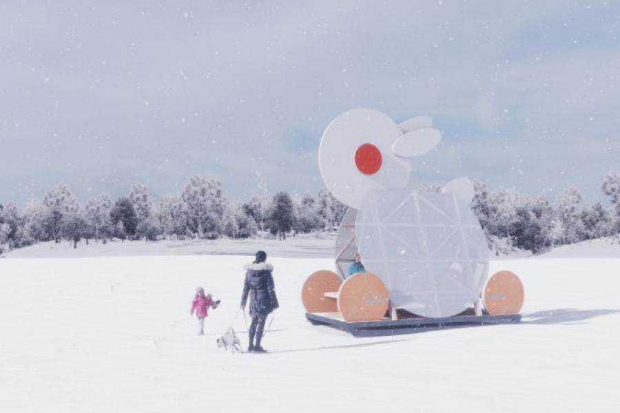 A snowy landscape with a parent and child walking a dog. They approach a large, abstract rabbit sculpture with geometric shapes and pastel colors.