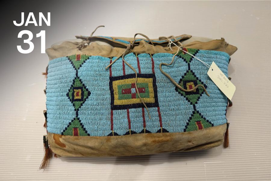 A vibrant beaded pouch with intricate geometric patterns in teal, red, green, and yellow on a light brown leather background.