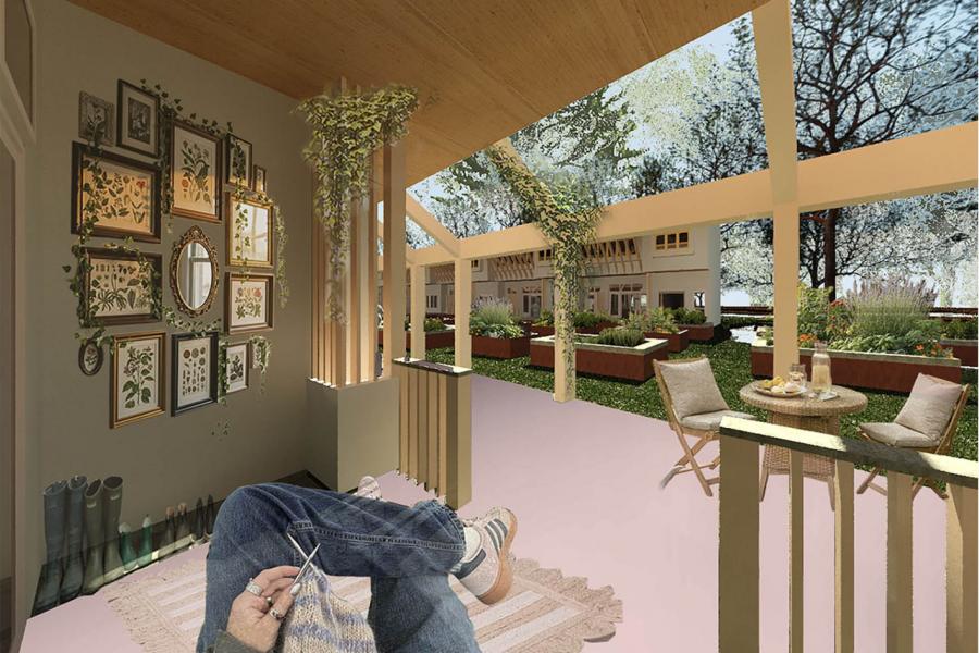 Cozy veranda with a knitting person, surrounded by framed botanical art. Overlooks a lush garden with trees and seating.
