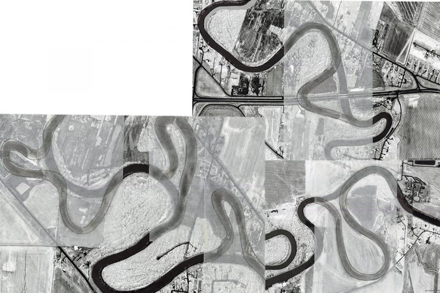 Aerial view of a landscape with winding river meanders cutting through patchwork fields.