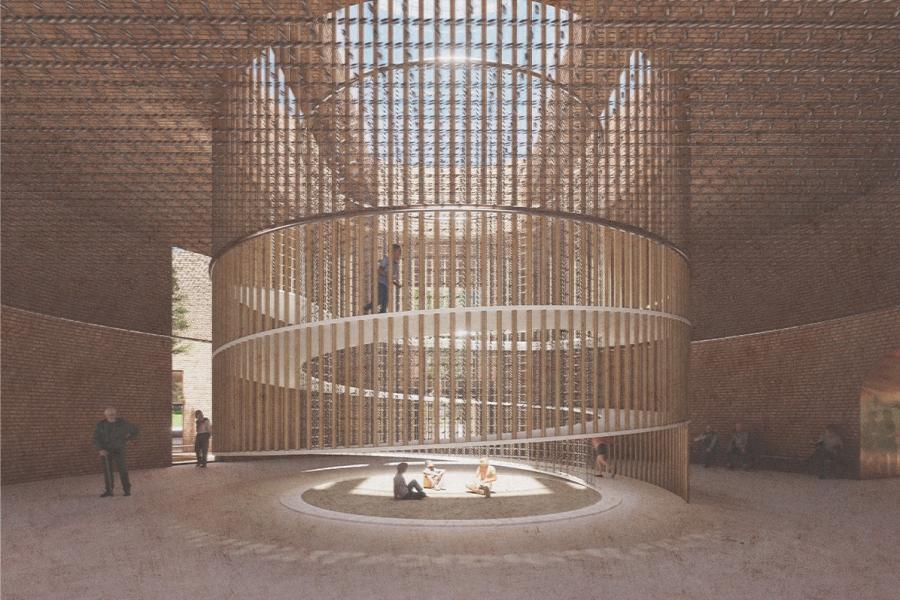 A spacious interior with brick walls features a circular, wooden spiral staircase in the center. Sunlight streams down, illuminating people seated below.