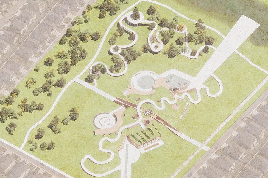 Aerial view of a park with winding paths, circular structures, and lush greenery. There's a mix of open grass areas and clusters of trees. A nearby residential area is visible.