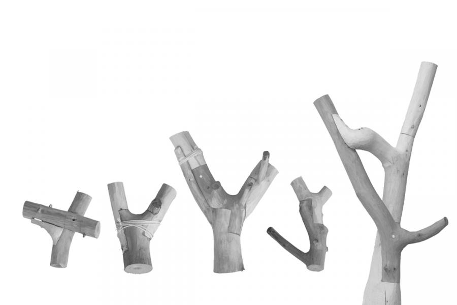 A series of five Y-shaped tree branches, arranged sequentially from left to right, each with unique designs on a white background.