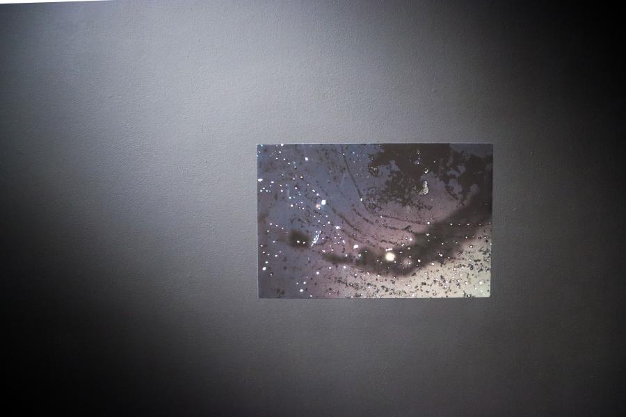 "Something that looks like stars in the microscope" (2024) - an inkjet print capturing a polarizing filter-enhanced microscopic view of silver nitrate.