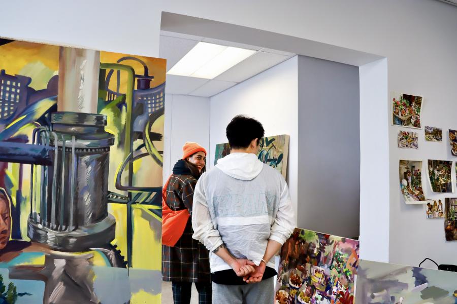 Student studio visit in progress. Painting studios in Taché Hall provide space for both independent exploration and mentorship.