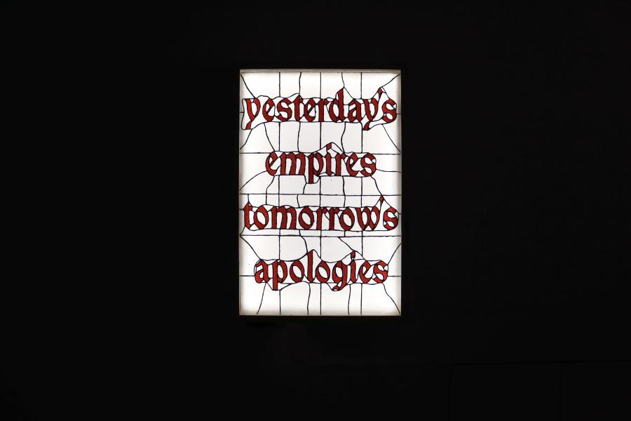 Illuminated artwork reading "yesterday's empires tomorrow's apologies."