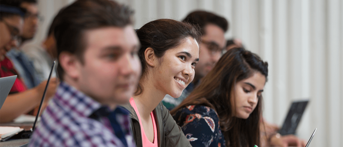 A shot of a UM student in class.
