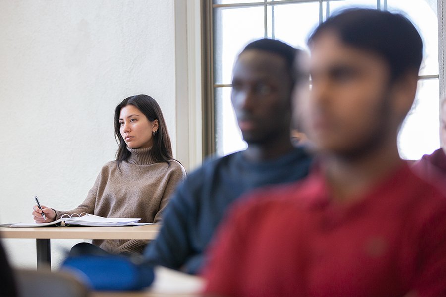 UM Philosophy student listening intently in class.
