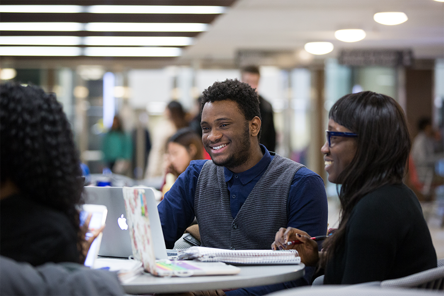 Students studying in a library.