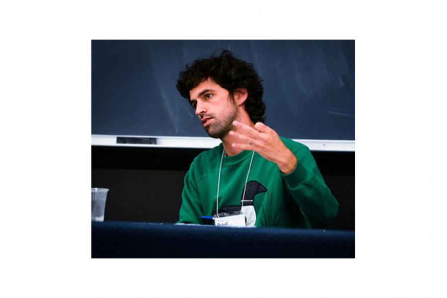 RJ Leland speaking at a panel event.