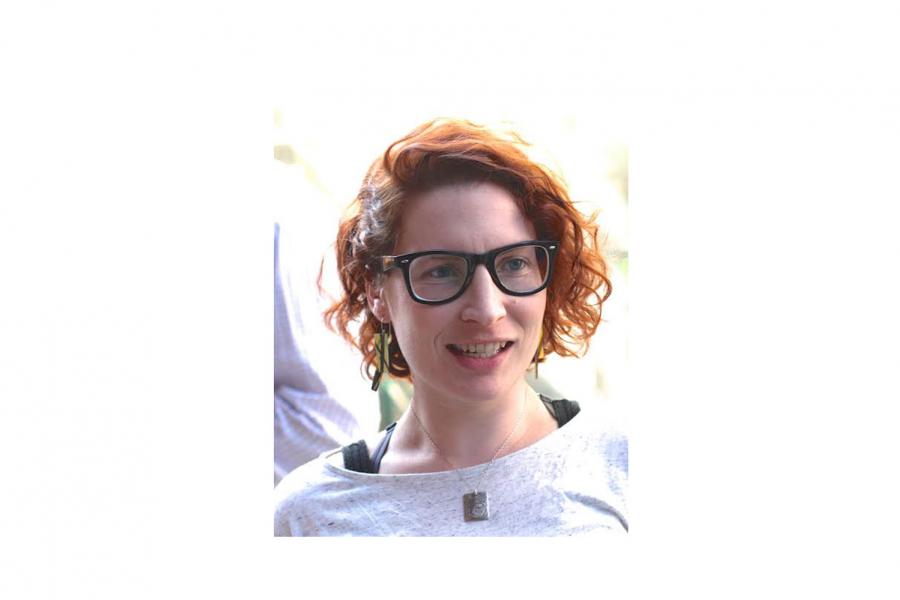 Headshot of Sarah Hannan standing outside.