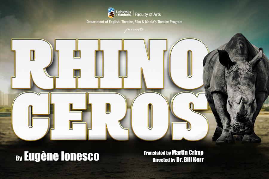 Large white letters spelling rhinocerous next to a standing rhinocerous.