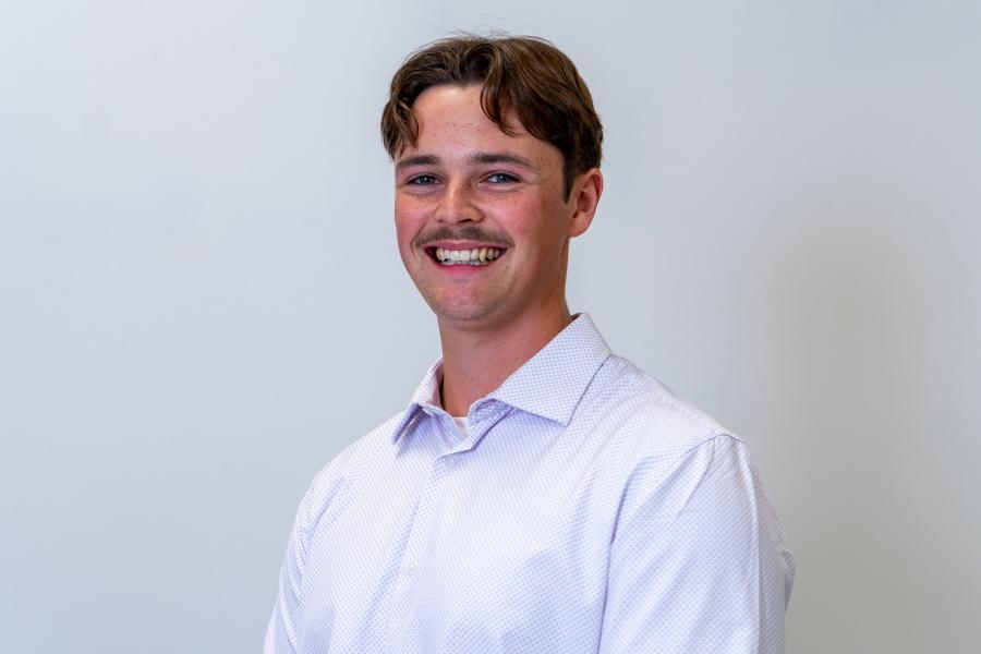 A headshot of Darian Ahronson