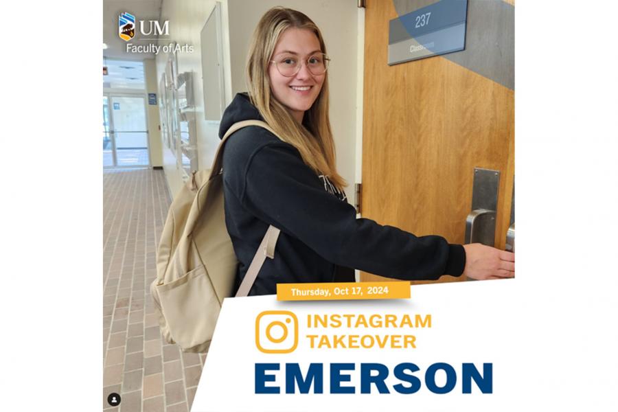 A student looking at the camera with a hand on a doorknob.