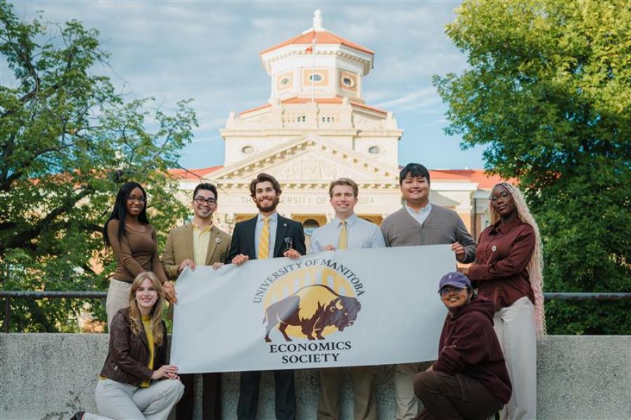 UM Economics student group in front of the Aministrative building