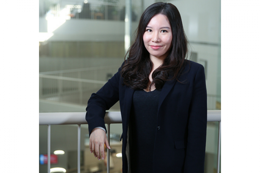 Assistant Professor Ya Gao's professional photoshoot. She is wearing full black blazer and shirt