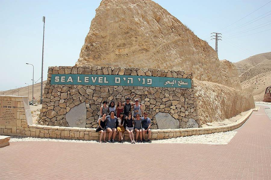 Group of students on exchange in the desert of Israel.