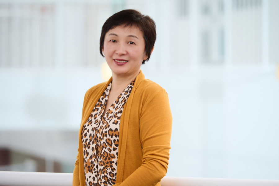 Image of a woman with short black hair.