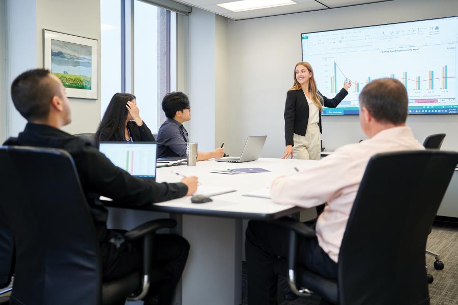 Woman presenting to group