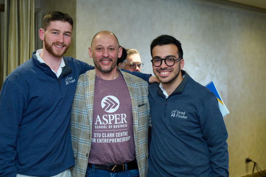 GradFinder students standing with Startup Coach Ben Isakov
