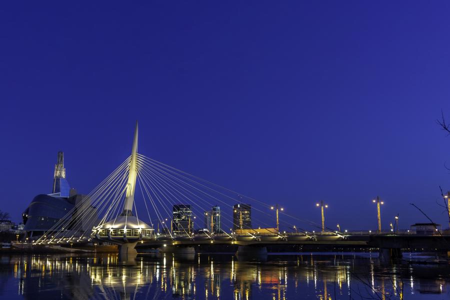 An image of winnipeg, featuring a bridge and the human rights museum
