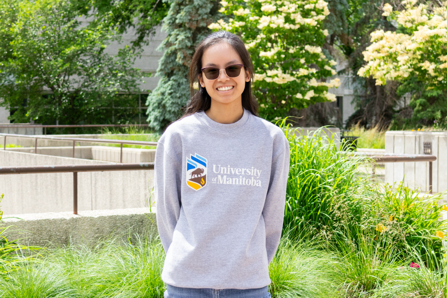 Student wearing University of Manitoba sweater 