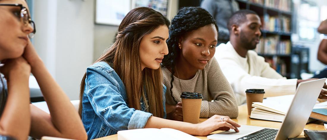 Students working in a library.