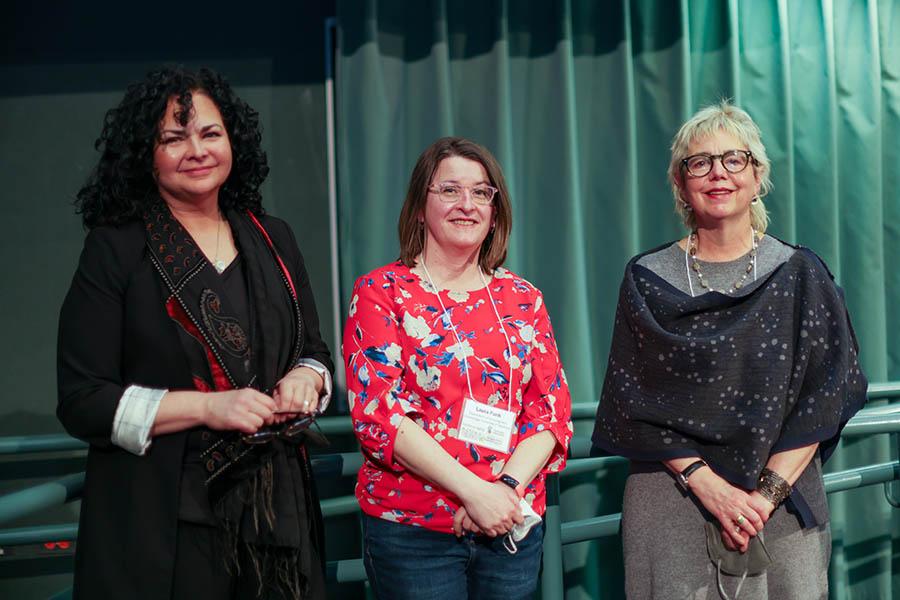 Two research affiliates and an invited speaker are standing before presenting on aging topics at the Centre's Symposium