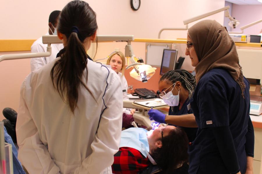 Nursing and Dentistry students work together. 