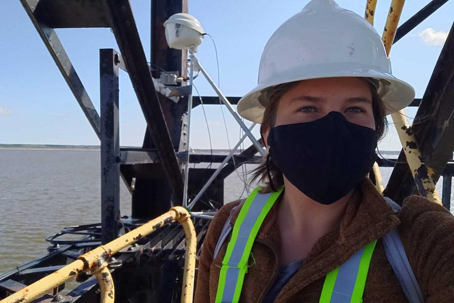Researcher Emma Ausen on a research vessel.